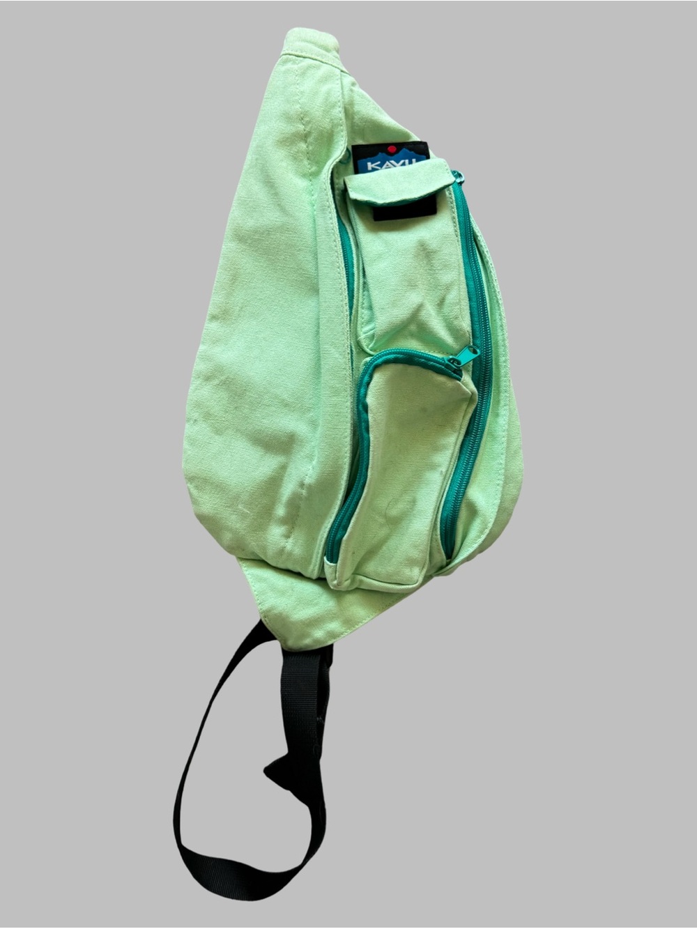 KAVU Mint Green Canvas Sling Bag with Teal Zippers and Adjustable Rope Strap